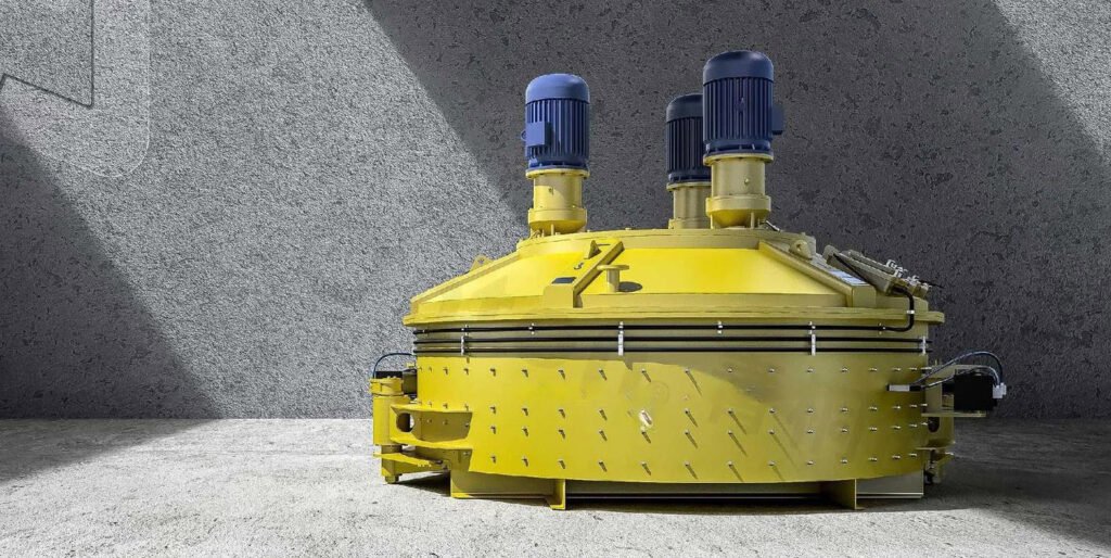 A yellow concrete mixer for cement sand aggregate