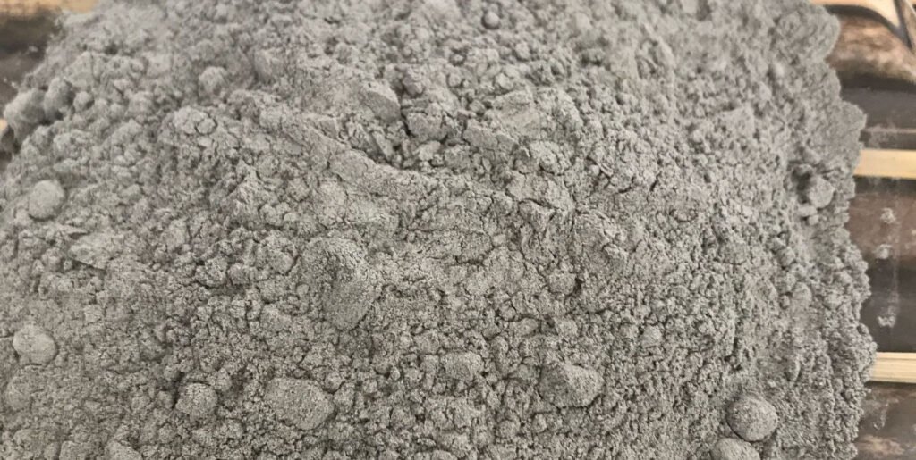 Pozzolana Cement Powder Close-Up – Fine Gray Construction Material