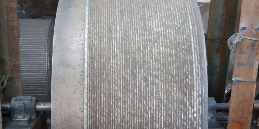 Service Life of Wear-Resistant Layers and Hardgrove Grindability Index (HGI) for Common Materials in Vertical Roller Mills