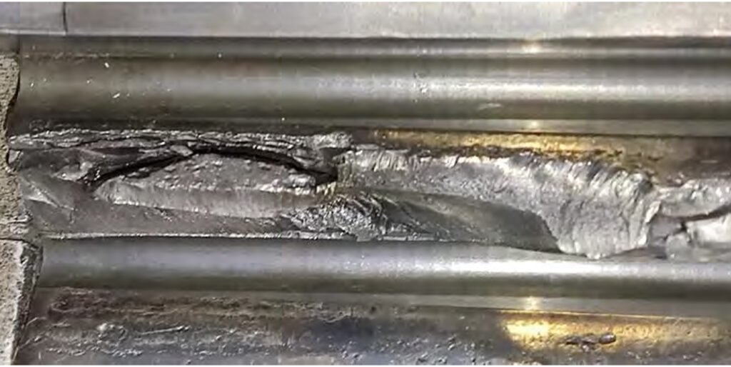 Tooth chips. Peeling of the tooth surface. Macropitting on the tooth surface. Numerous dents on the tooth surface.