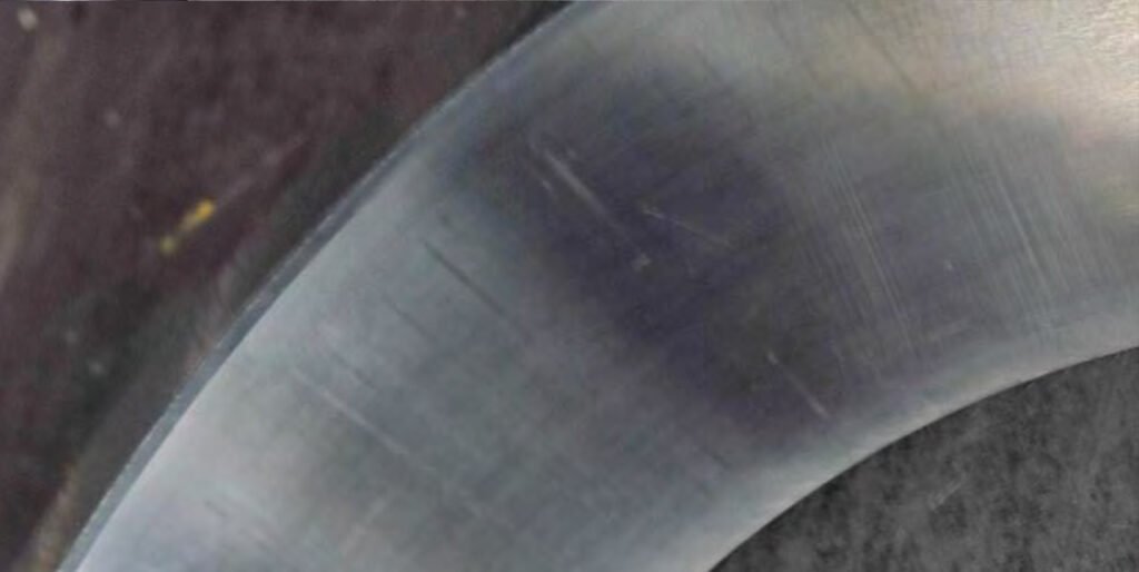 Peeling of roller and outer race surfaces. Brinelling. Dents on roller and outer race surfaces.