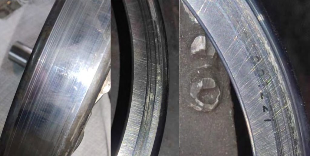 Peeling of the roller and outer race surfaces. Numerous dents on the roller and outer race surfaces. Brinelling. Traces of bearing rotation in the housing.