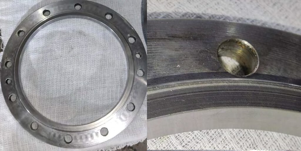 Wear of the cover thrust flange due to increased axial pressure of the outer race.